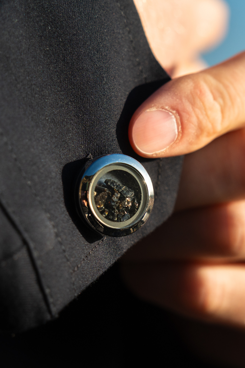 Dragon Glass Cufflinks by Lava Show 
orn with a black shirt.