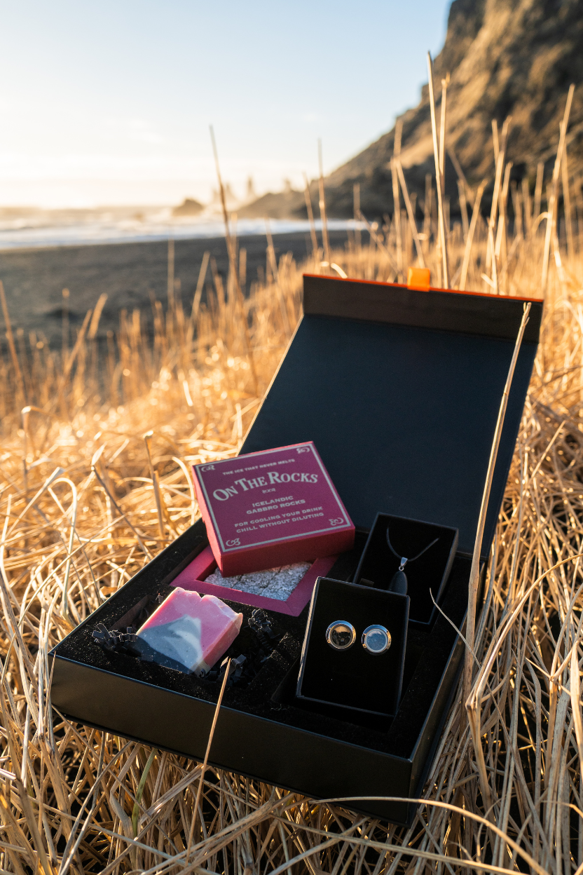 Open Mr. Lava Lava giftbox from Lava Show with on a grassy field with a scenic background.