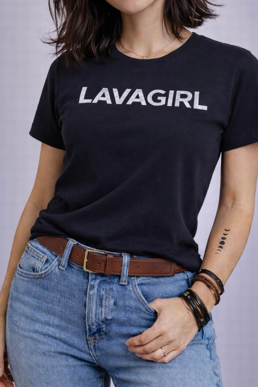 Person wearing a black 'LAVAGIRL' t-shirt with a plain background