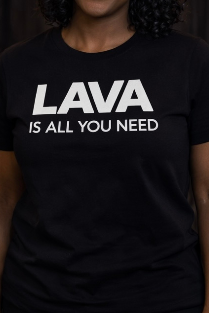 Black t-shirt with 'LAVA IS ALL YOU NEED' text worn by a person.